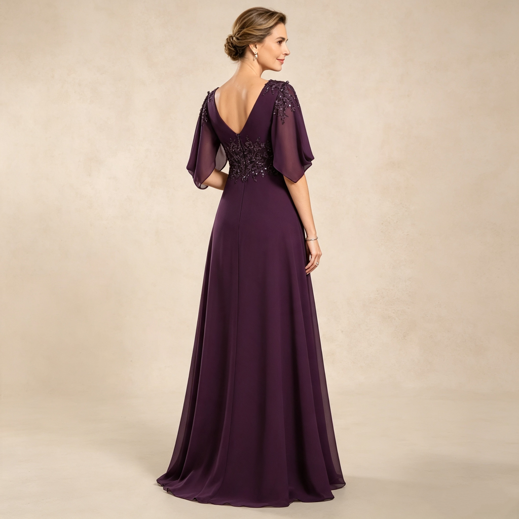 Elegantes bodenlanges Festkleid mit V-Ausschnitt und verzierten Flügelärmeln