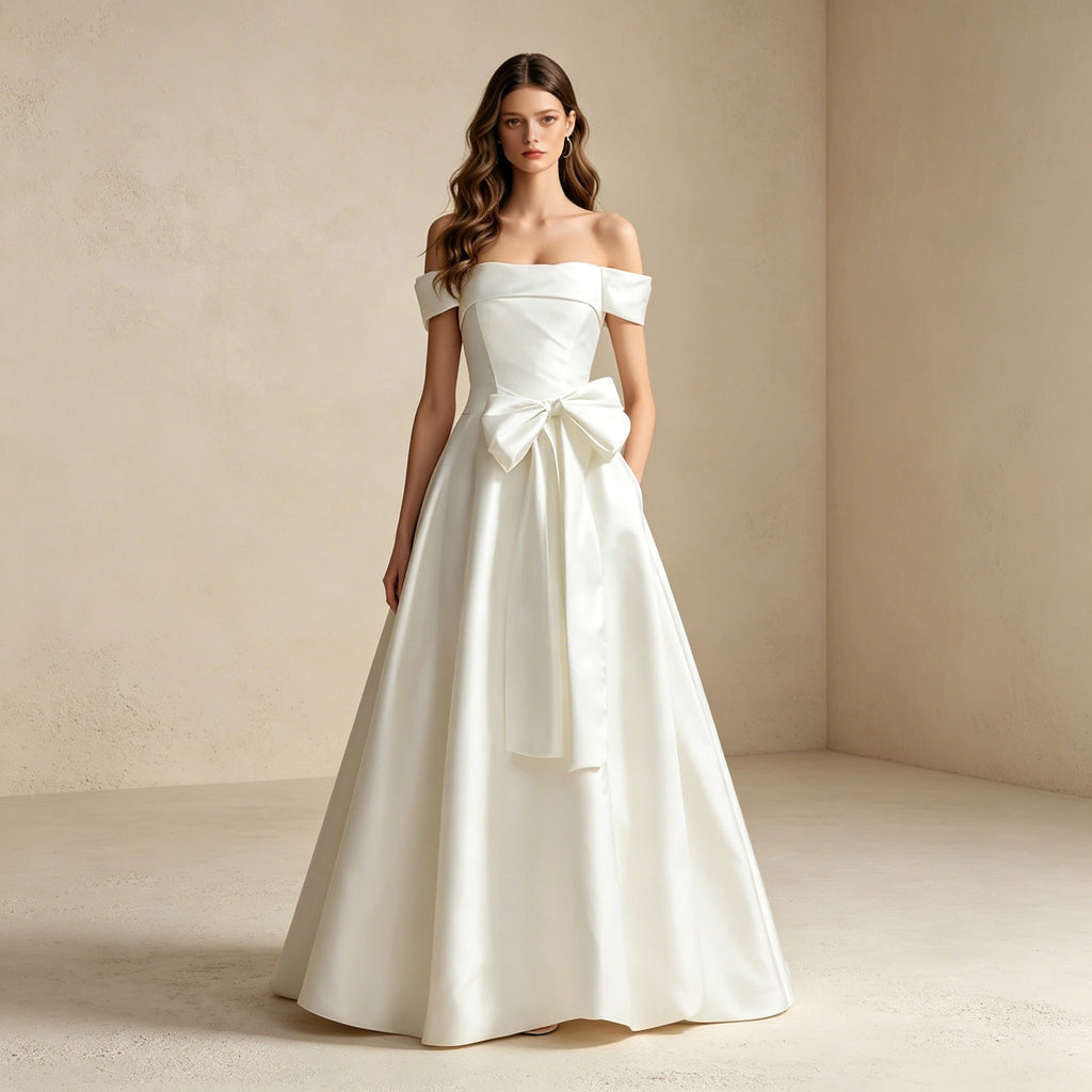 Off-Shoulder Abendkleid mit großer Schleife – Elegantes Satin-Maxikleid in Weiß
